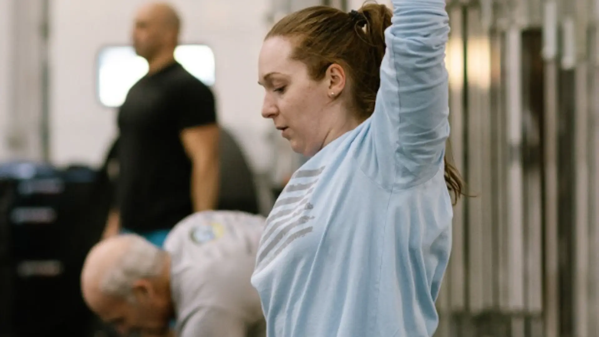 Class member scaling a movement with coaching during a CrossFit Dýr class in Groton, CT