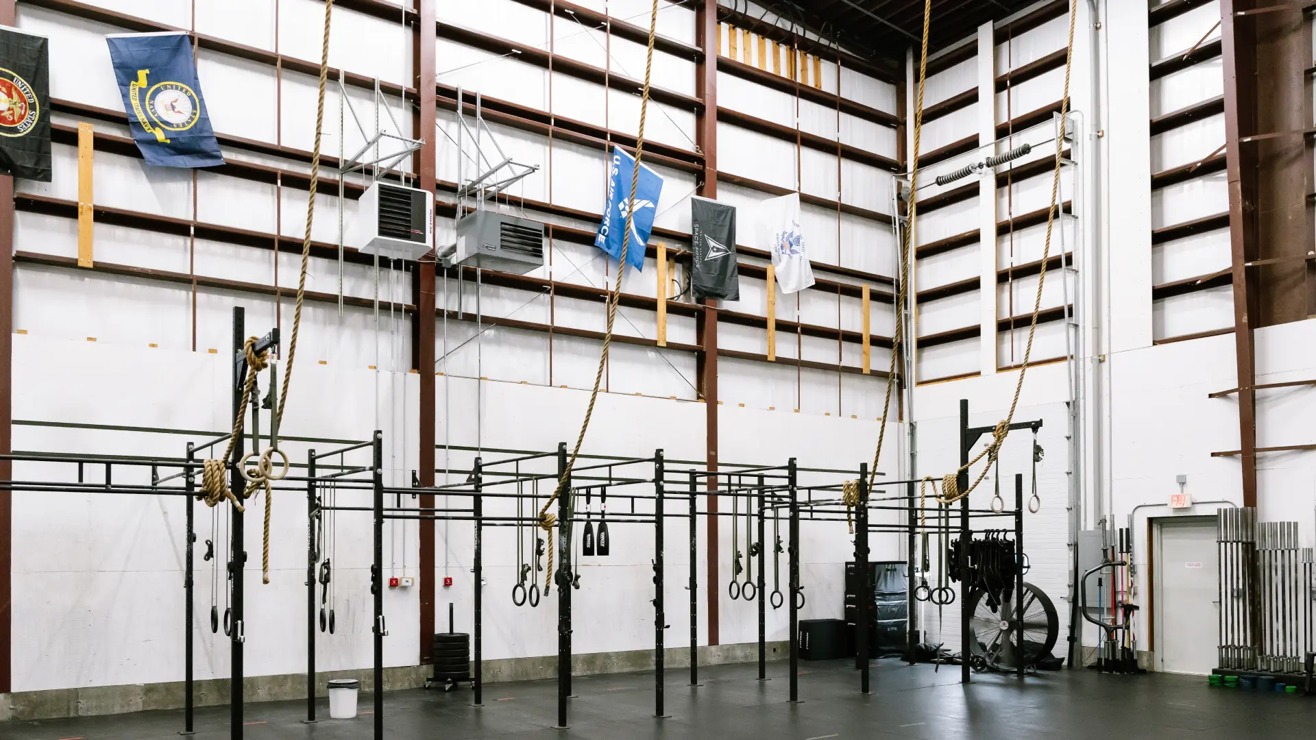 Rig with rings, ropes and pull-up bars in the open training area at O.N. Athletics in Groton, CT