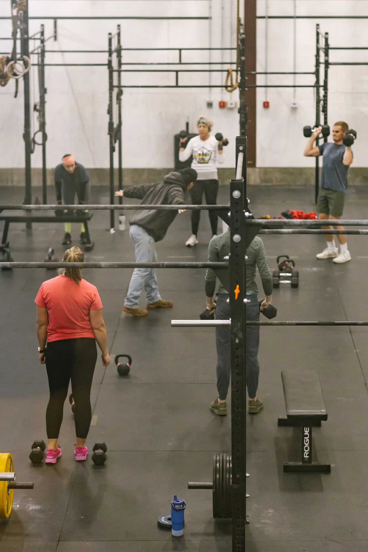 Class members working through a conditioning round side by side at CrossFit Dýr in Mystic, CT