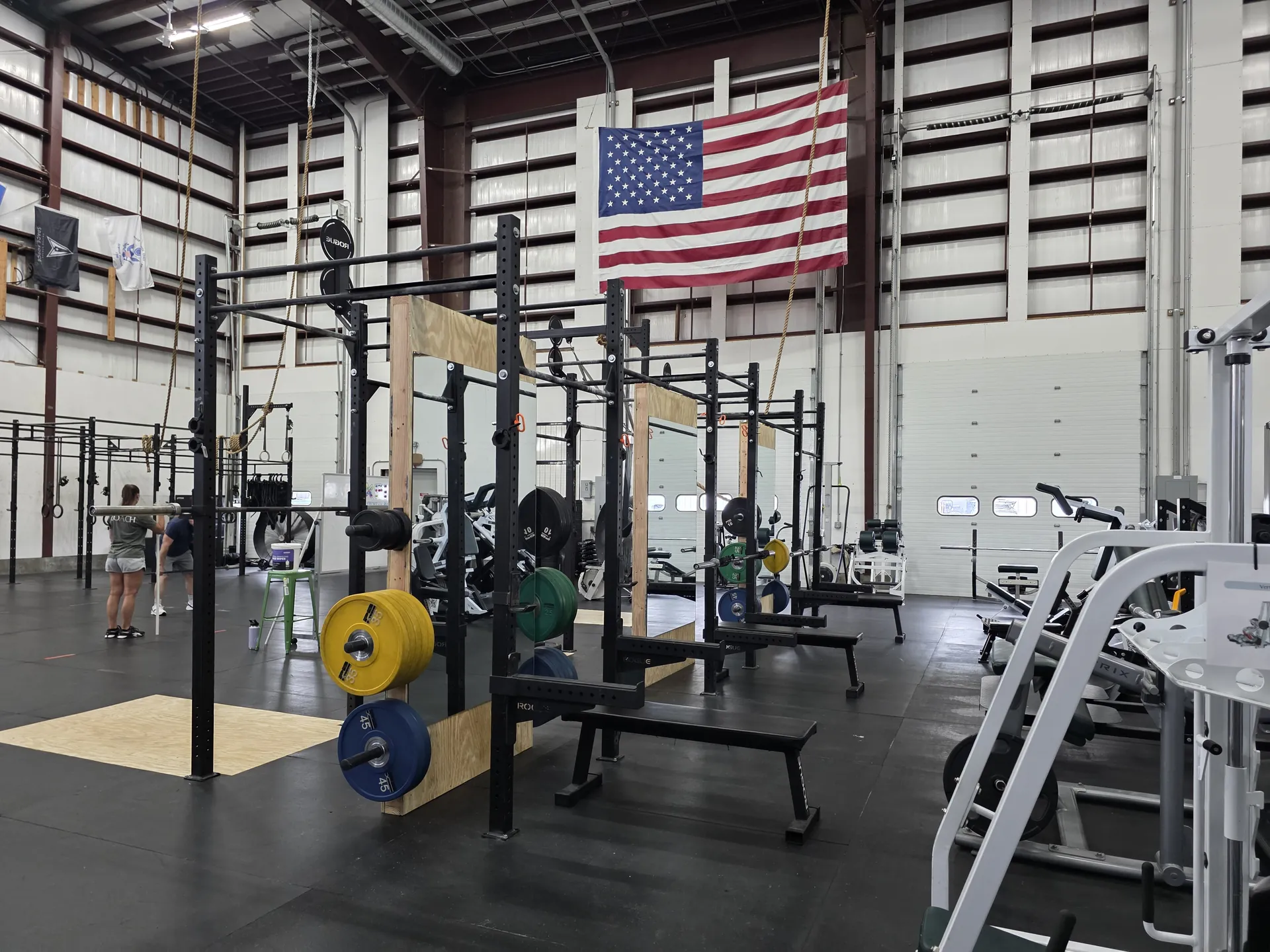 Free weight floor with dumbbell racks and benches at O.N. Athletics in Mystic, CT